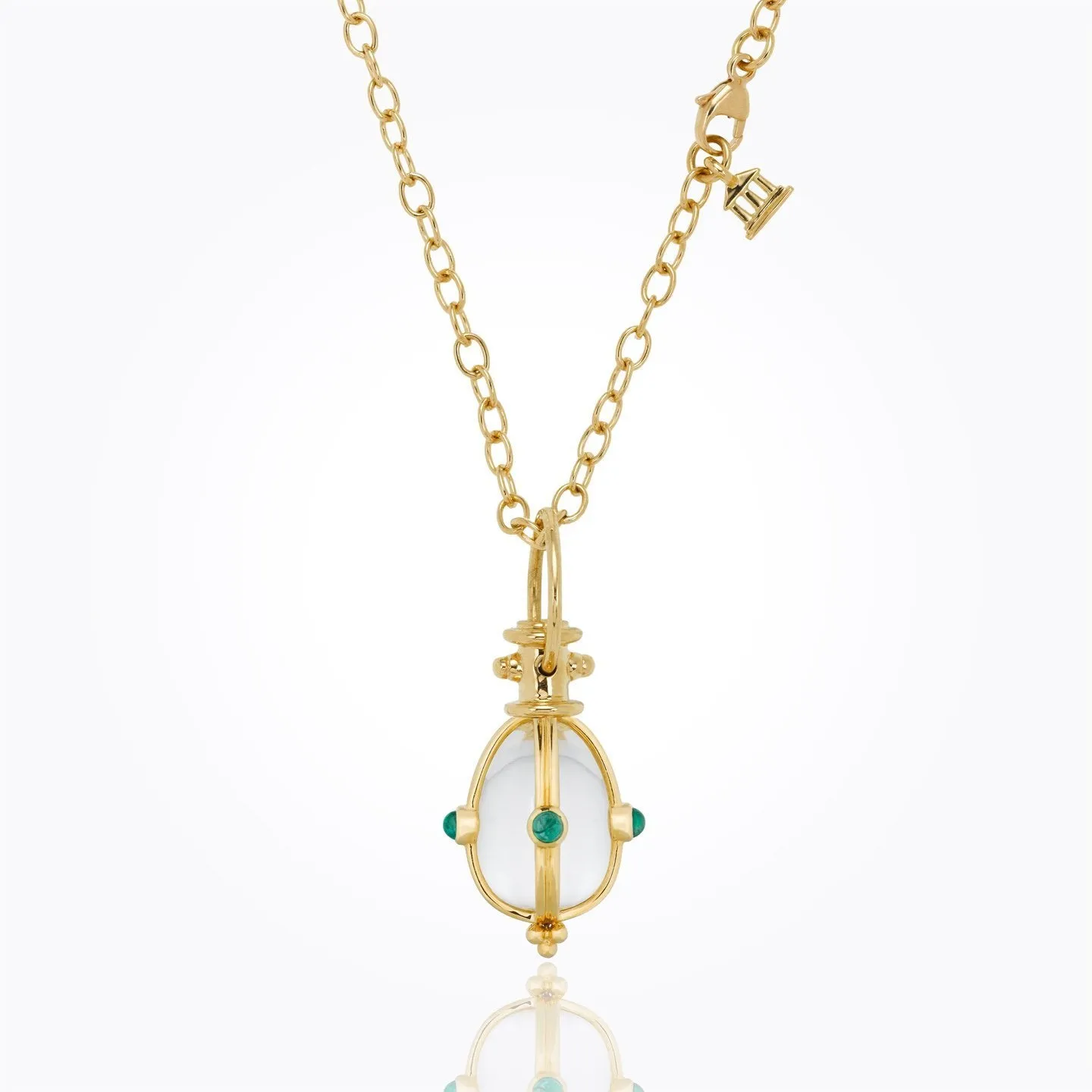 18K Classic Amulet with oval rock crystal and cabochon emerald