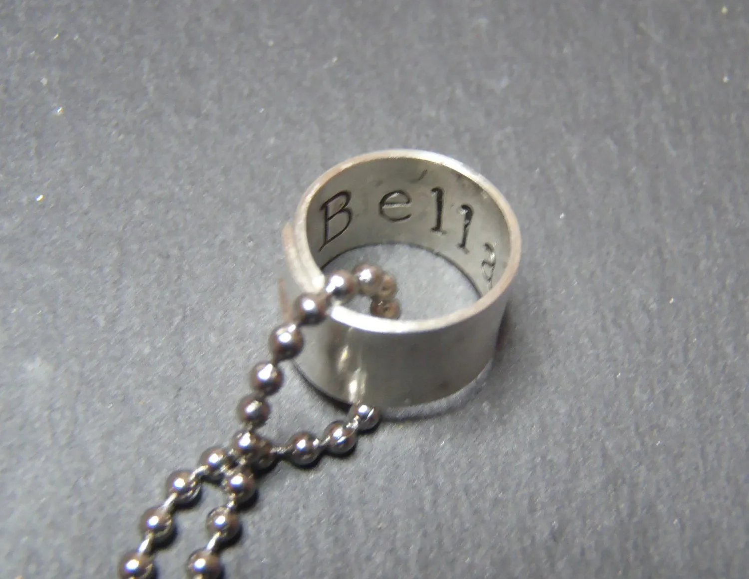 Personalized Pet memorial Necklace for dog or cat with stamped pawprint and name inside the charm